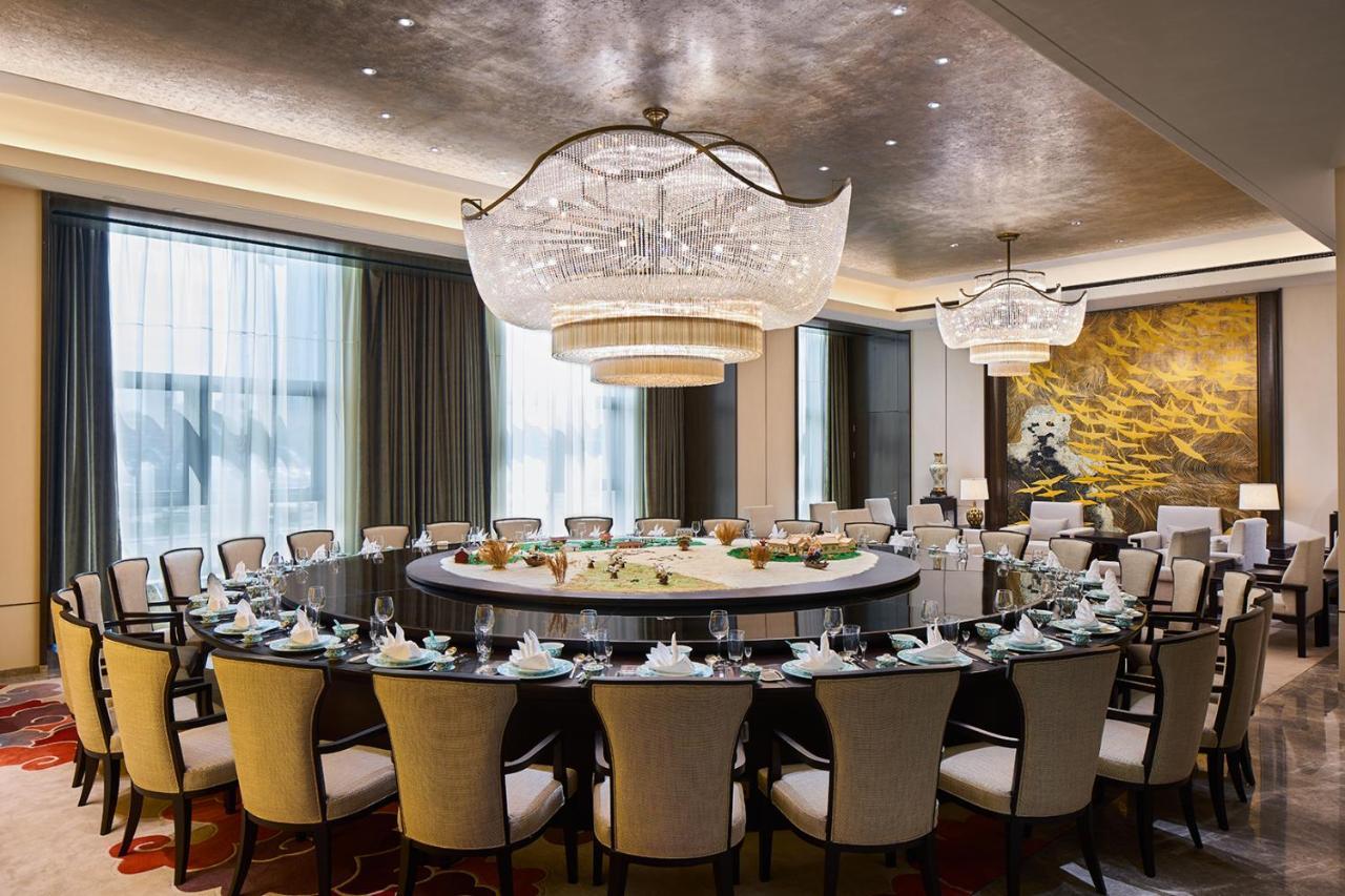 Hotel Wanda Realm Qiqihar Esterno foto